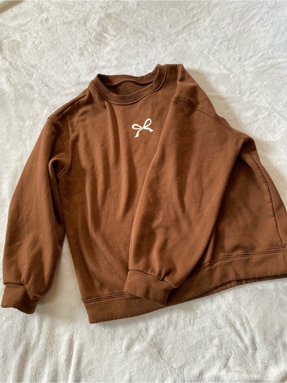 Brown Crewneck Sweater with White Bow Accent